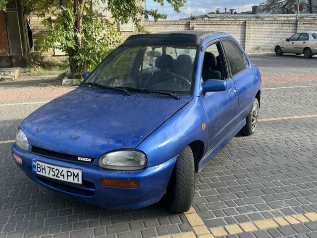 Синій Мазда 121, об'ємом двигуна 1.3 л та пробігом 347 тис. км за 999 $, фото 1 на Automoto.ua
