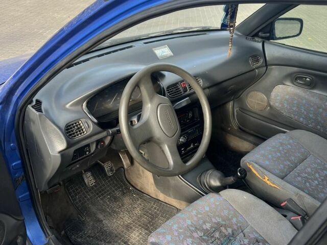 Синій Мазда 121, об'ємом двигуна 1.3 л та пробігом 347 тис. км за 999 $, фото 3 на Automoto.ua
