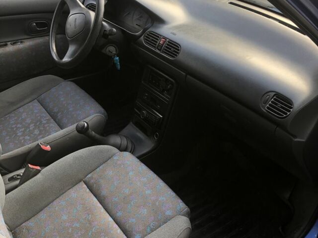 Синий Мазда 121, объемом двигателя 1.3 л и пробегом 173 тыс. км за 1025 $, фото 8 на Automoto.ua