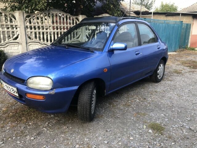 Синий Мазда 121, объемом двигателя 1.3 л и пробегом 173 тыс. км за 1025 $, фото 2 на Automoto.ua