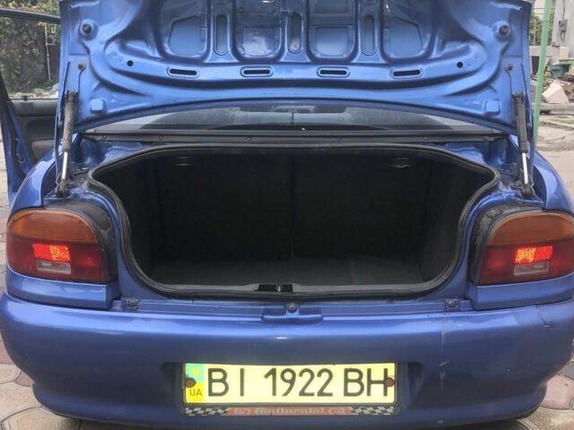 Синий Мазда 121, объемом двигателя 1.3 л и пробегом 173 тыс. км за 1025 $, фото 12 на Automoto.ua