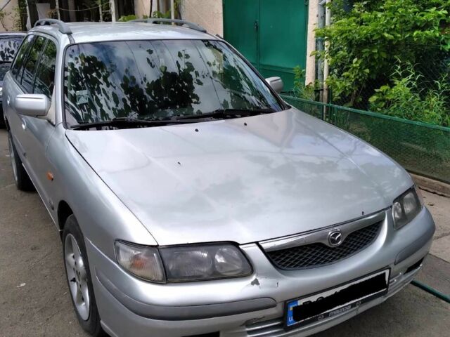 Мазда 131 1999 у Мукачеве на Automoto.ua Сірий Мазда 131, об'ємом двигуна 2 л та пробігом 440 тис. км за 2350 $, фото 7 на Automoto.ua