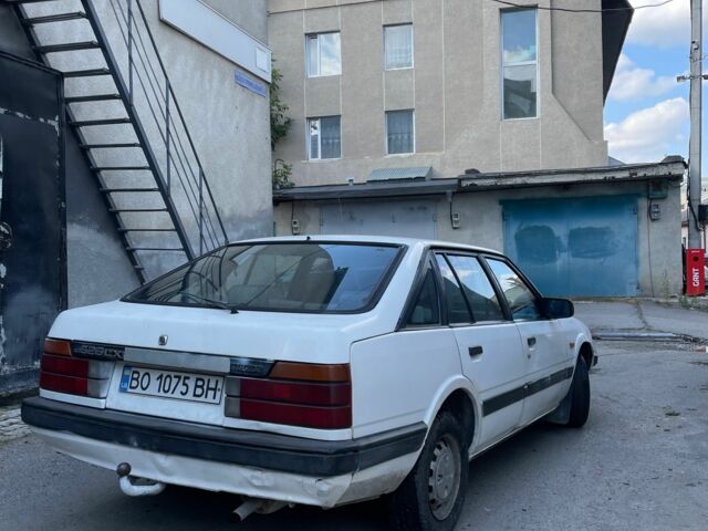 Белый Мазда 2, объемом двигателя 1.6 л и пробегом 356 тыс. км за 550 $, фото 3 на Automoto.ua