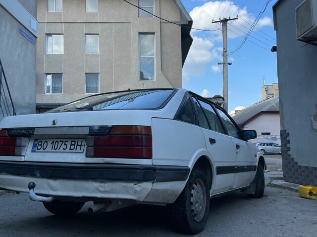 Белый Мазда 2, объемом двигателя 1.6 л и пробегом 356 тыс. км за 550 $, фото 14 на Automoto.ua