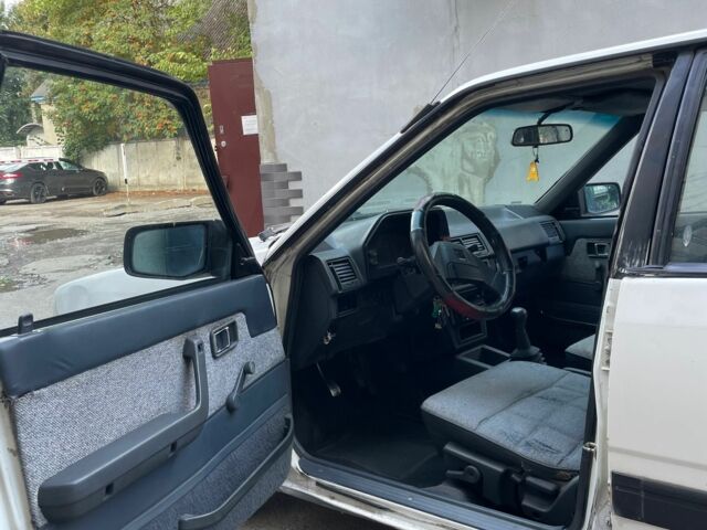 Белый Мазда 2, объемом двигателя 1.6 л и пробегом 356 тыс. км за 550 $, фото 6 на Automoto.ua