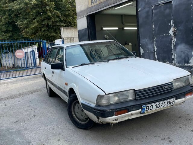Белый Мазда 2, объемом двигателя 1.6 л и пробегом 356 тыс. км за 550 $, фото 4 на Automoto.ua