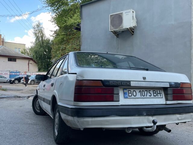 Белый Мазда 2, объемом двигателя 1.6 л и пробегом 356 тыс. км за 550 $, фото 13 на Automoto.ua