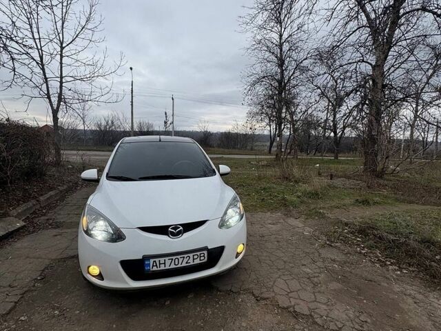 Белый Мазда 2, объемом двигателя 1.4 л и пробегом 230 тыс. км за 4100 $, фото 2 на Automoto.ua
