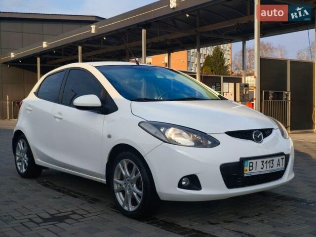 Белый Мазда 2, объемом двигателя 1.5 л и пробегом 165 тыс. км за 5200 $, фото 4 на Automoto.ua