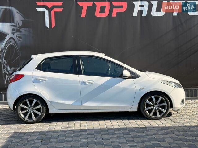 Білий Мазда 2, об'ємом двигуна 1.4 л та пробігом 245 тис. км за 4300 $, фото 8 на Automoto.ua
