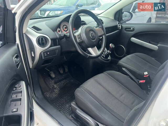 Білий Мазда 2, об'ємом двигуна 1.5 л та пробігом 170 тис. км за 5800 $, фото 18 на Automoto.ua