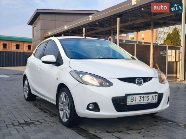 Белый Мазда 2, объемом двигателя 1.5 л и пробегом 165 тыс. км за 5200 $, фото 9 на Automoto.ua