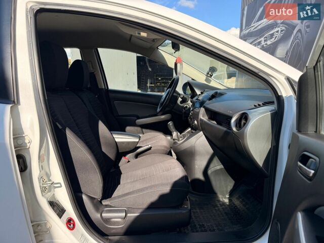 Білий Мазда 2, об'ємом двигуна 1.4 л та пробігом 245 тис. км за 4300 $, фото 25 на Automoto.ua