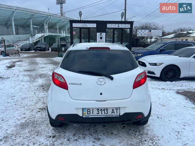 Білий Мазда 2, об'ємом двигуна 1.5 л та пробігом 170 тис. км за 5800 $, фото 5 на Automoto.ua