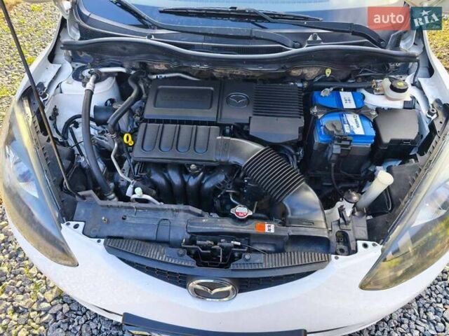 Білий Мазда 2, об'ємом двигуна 1.5 л та пробігом 165 тис. км за 5550 $, фото 7 на Automoto.ua