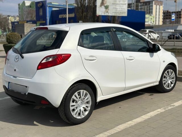 Білий Мазда 2, об'ємом двигуна 1.4 л та пробігом 240 тис. км за 4800 $, фото 2 на Automoto.ua