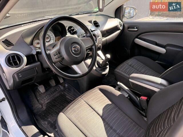 Білий Мазда 2, об'ємом двигуна 1.4 л та пробігом 245 тис. км за 4300 $, фото 17 на Automoto.ua