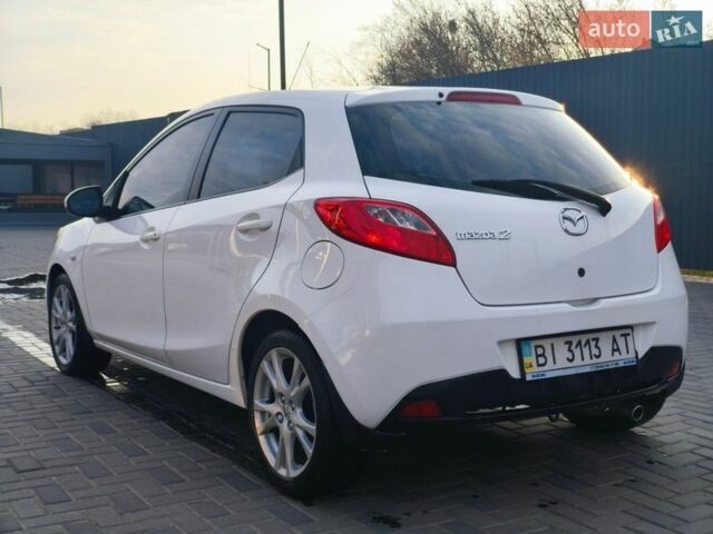 Белый Мазда 2, объемом двигателя 1.5 л и пробегом 165 тыс. км за 5200 $, фото 1 на Automoto.ua
