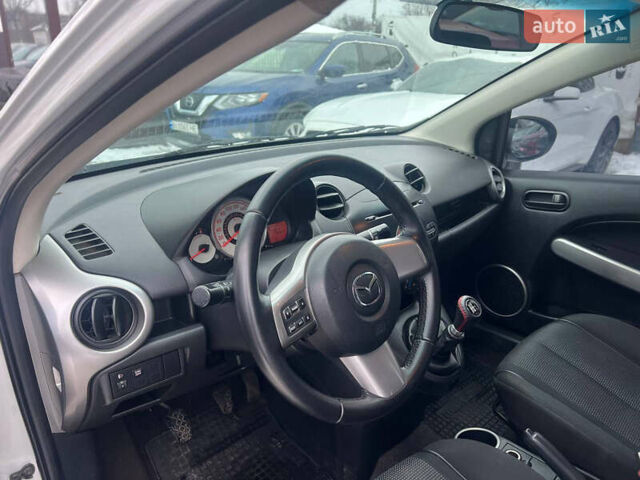 Білий Мазда 2, об'ємом двигуна 1.5 л та пробігом 170 тис. км за 5800 $, фото 17 на Automoto.ua