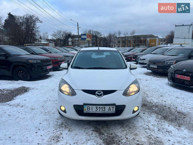 Білий Мазда 2, об'ємом двигуна 1.5 л та пробігом 170 тис. км за 5800 $, фото 2 на Automoto.ua