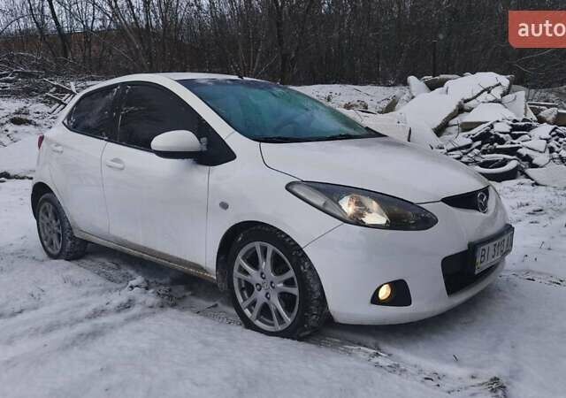 Білий Мазда 2, об'ємом двигуна 1.5 л та пробігом 170 тис. км за 5500 $, фото 1 на Automoto.ua