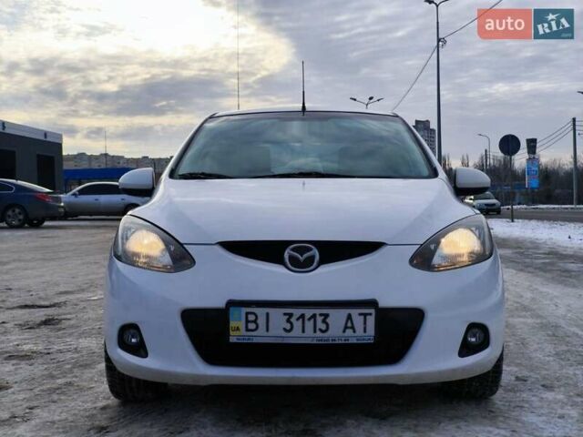 Білий Мазда 2, об'ємом двигуна 1.5 л та пробігом 165 тис. км за 5500 $, фото 1 на Automoto.ua