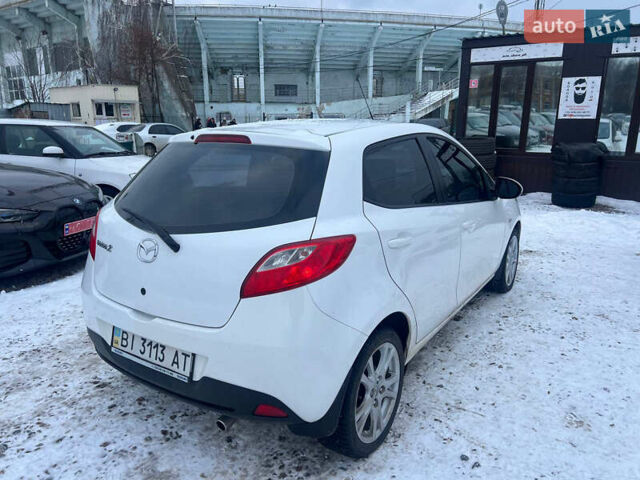 Білий Мазда 2, об'ємом двигуна 1.5 л та пробігом 170 тис. км за 5800 $, фото 6 на Automoto.ua