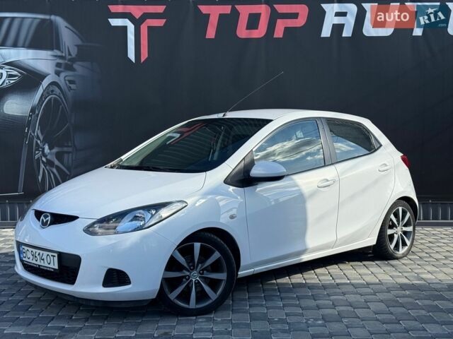 Білий Мазда 2, об'ємом двигуна 1.4 л та пробігом 245 тис. км за 4300 $, фото 1 на Automoto.ua