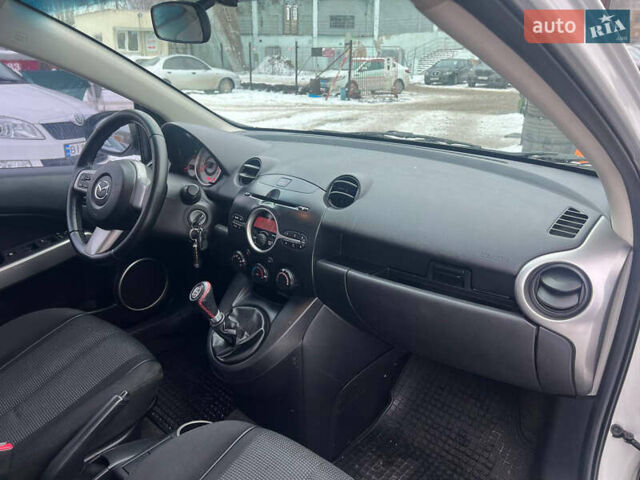 Білий Мазда 2, об'ємом двигуна 1.5 л та пробігом 170 тис. км за 5800 $, фото 15 на Automoto.ua