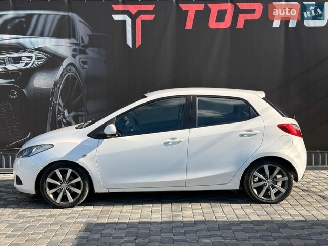 Білий Мазда 2, об'ємом двигуна 1.4 л та пробігом 245 тис. км за 4300 $, фото 7 на Automoto.ua