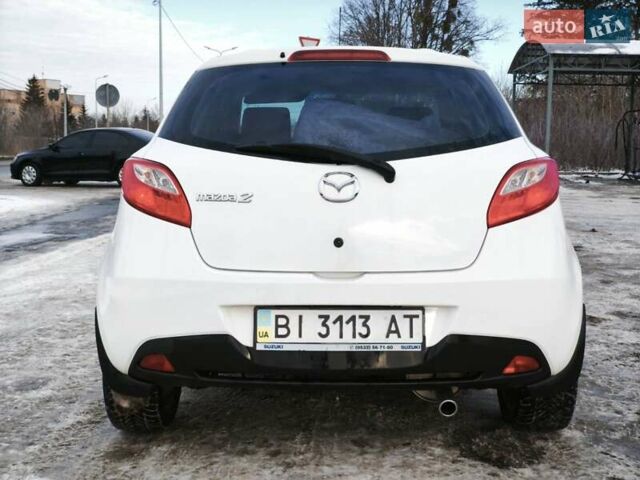 Білий Мазда 2, об'ємом двигуна 1.5 л та пробігом 165 тис. км за 5500 $, фото 7 на Automoto.ua