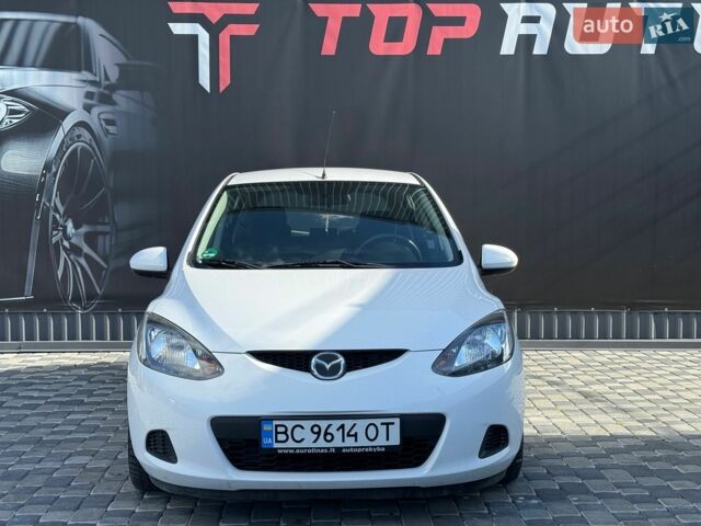 Білий Мазда 2, об'ємом двигуна 1.4 л та пробігом 245 тис. км за 4300 $, фото 6 на Automoto.ua