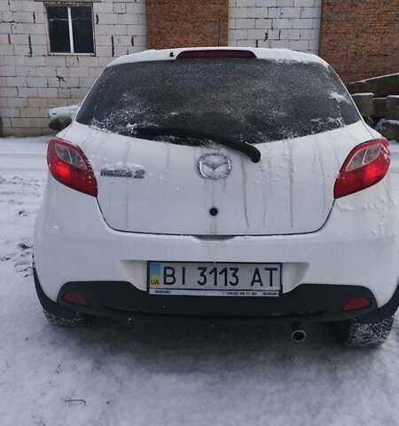 Білий Мазда 2, об'ємом двигуна 1.5 л та пробігом 170 тис. км за 5500 $, фото 3 на Automoto.ua