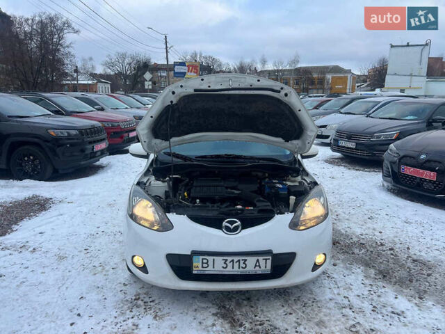 Білий Мазда 2, об'ємом двигуна 1.5 л та пробігом 170 тис. км за 5800 $, фото 9 на Automoto.ua