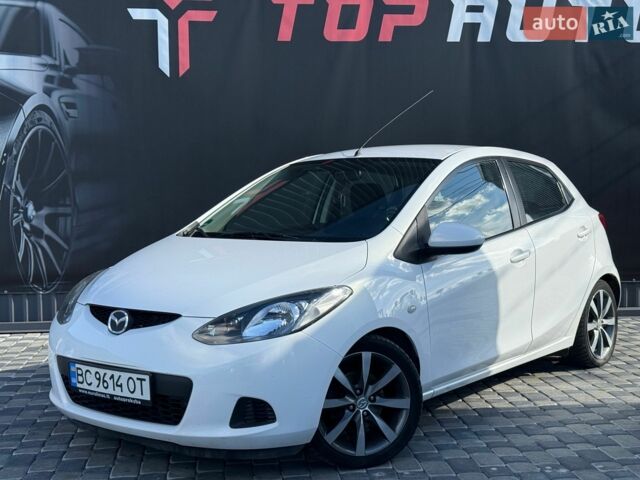 Білий Мазда 2, об'ємом двигуна 1.4 л та пробігом 245 тис. км за 4300 $, фото 2 на Automoto.ua