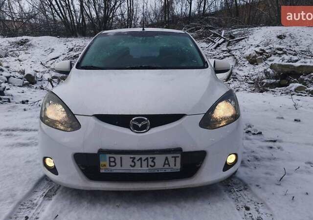 Білий Мазда 2, об'ємом двигуна 1.5 л та пробігом 170 тис. км за 5500 $, фото 6 на Automoto.ua