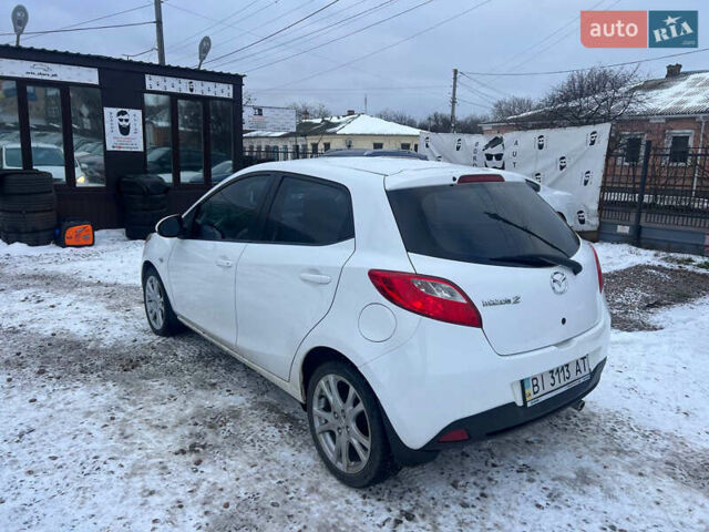 Білий Мазда 2, об'ємом двигуна 1.5 л та пробігом 170 тис. км за 5800 $, фото 4 на Automoto.ua