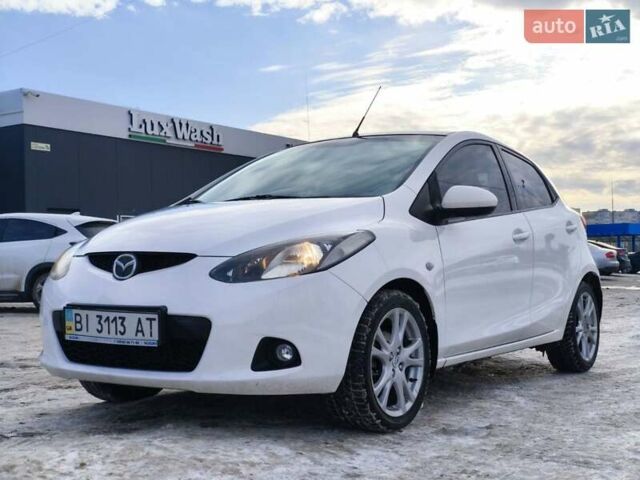 Білий Мазда 2, об'ємом двигуна 1.5 л та пробігом 165 тис. км за 5500 $, фото 3 на Automoto.ua