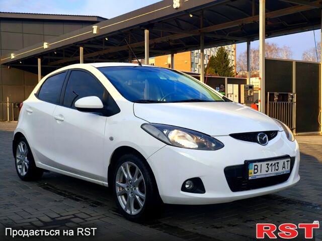 Білий Мазда 2, об'ємом двигуна 1.5 л та пробігом 170 тис. км за 5300 $, фото 5 на Automoto.ua