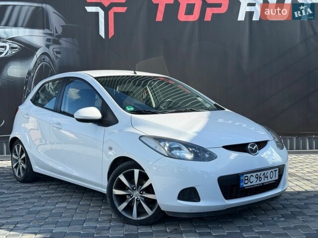 Білий Мазда 2, об'ємом двигуна 1.4 л та пробігом 245 тис. км за 4300 $, фото 5 на Automoto.ua