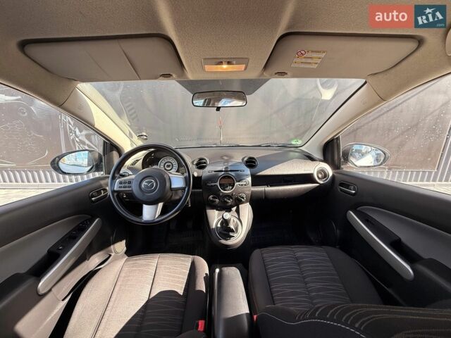 Білий Мазда 2, об'ємом двигуна 1.4 л та пробігом 245 тис. км за 4300 $, фото 34 на Automoto.ua