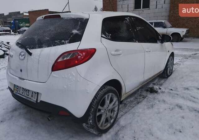 Білий Мазда 2, об'ємом двигуна 1.5 л та пробігом 170 тис. км за 5500 $, фото 4 на Automoto.ua