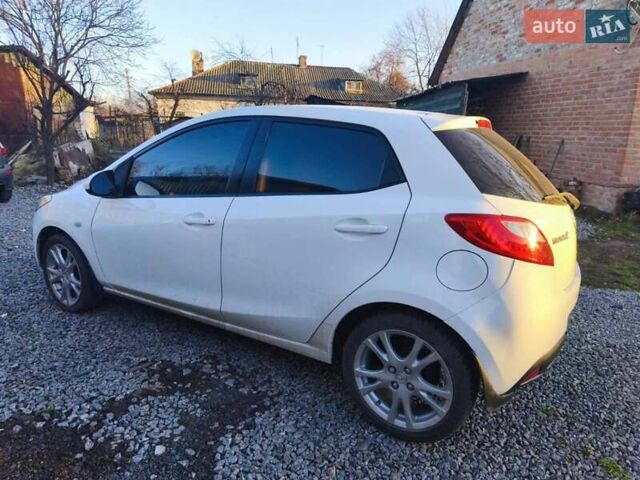 Білий Мазда 2, об'ємом двигуна 1.5 л та пробігом 165 тис. км за 5550 $, фото 1 на Automoto.ua