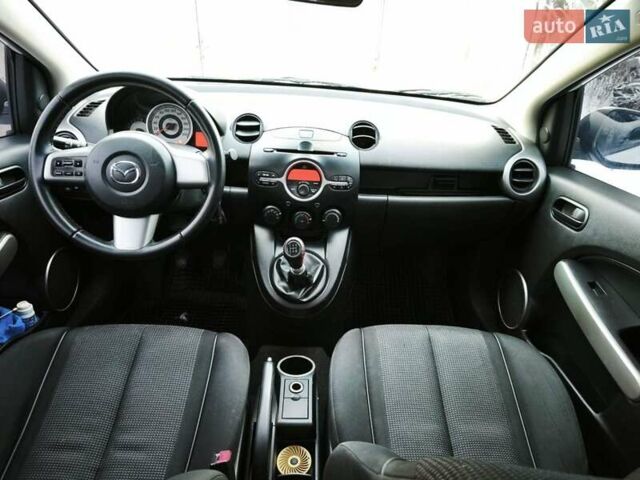 Білий Мазда 2, об'ємом двигуна 1.5 л та пробігом 165 тис. км за 5500 $, фото 10 на Automoto.ua