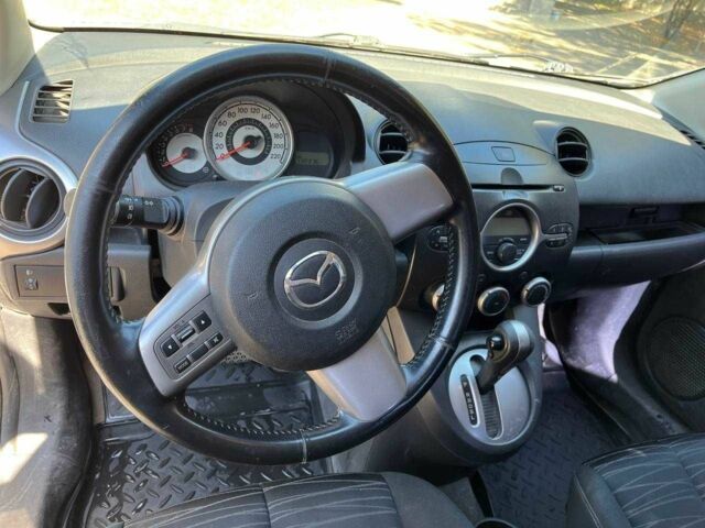 Білий Мазда 2, об'ємом двигуна 1.5 л та пробігом 13 тис. км за 5200 $, фото 1 на Automoto.ua