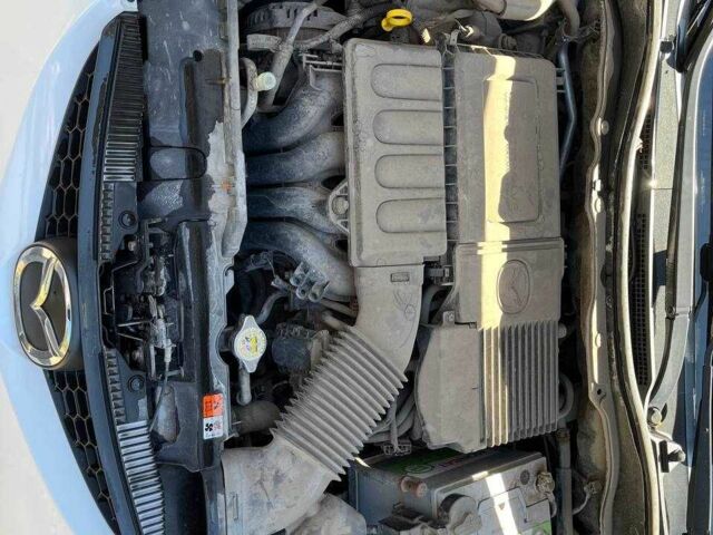 Білий Мазда 2, об'ємом двигуна 1.5 л та пробігом 13 тис. км за 5200 $, фото 10 на Automoto.ua