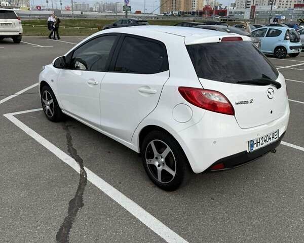 Білий Мазда 2, об'ємом двигуна 1.5 л та пробігом 135 тис. км за 7654 $, фото 4 на Automoto.ua