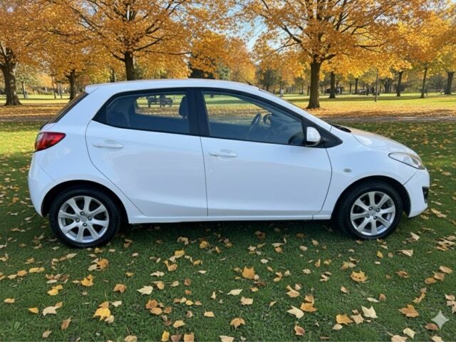 Білий Мазда 2, об'ємом двигуна 1.5 л та пробігом 139 тис. км за 5900 $, фото 5 на Automoto.ua