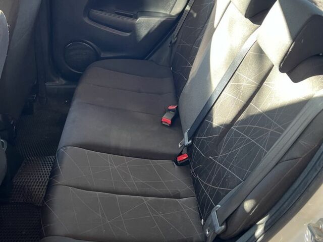 Білий Мазда 2, об'ємом двигуна 1.5 л та пробігом 139 тис. км за 5900 $, фото 13 на Automoto.ua