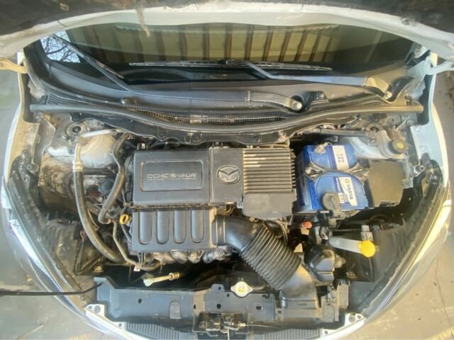 Білий Мазда 2, об'ємом двигуна 1.5 л та пробігом 139 тис. км за 5900 $, фото 17 на Automoto.ua